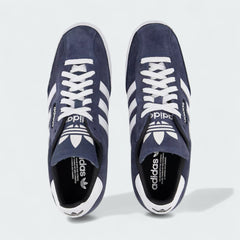 Top-down view of a pair of Adidas Samba Super Men's trainers in navy, highlighting the suede upper, white laces, and iconic 3-Stripes.