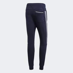 Navy blue jogger pants with white stripes on a light gray background