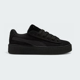 Puma Creeper Phatty x Fenty Unisex trainers in black corduroy, side profile showing the chunky platform sole and classic Puma Formstrip.