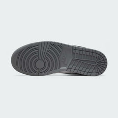 View of the outsole of the Air Jordan 1 Low Men's trainers, showing the durable rubber sole in grey with classic traction pattern.