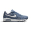 Side profile of the Nike Air Max IVO Men's Trainer in Ocean Fog and White showing mesh, leather, and ripstop upper, white foam midsole, dual-pressure Air-Sole unit, and white Swoosh.
