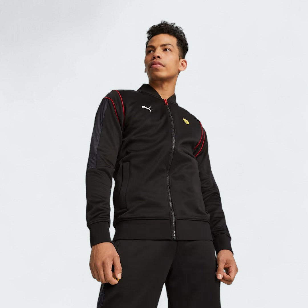 Puma x Ferrari Race MT7 Track Jacket Men's in black, worn by model front view showing full-zip closure, stand-up collar, and embroidered Ferrari and Puma logos.