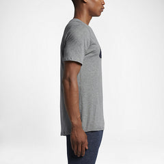 Nike Men's Futura Icon Tee Shirt in grey, side profile showing short sleeves, classic fit, and the overall silhouette.