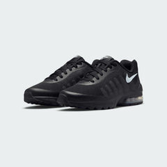 Nike Air Max Invigor Juniors Trainers Black 749572-003 angled view showing sculpted midsole and sleek profile