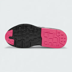 View of the outsole of the Nike Air Max Invigor Children's black trainers, showing the durable rubber tread pattern.
