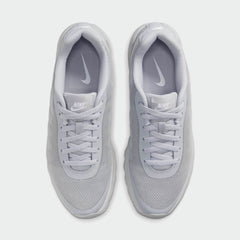 Top-down view of a pair of Nike Air Max Invigor Men's trainers in grey, highlighting their streamlined design and lace-up closure.