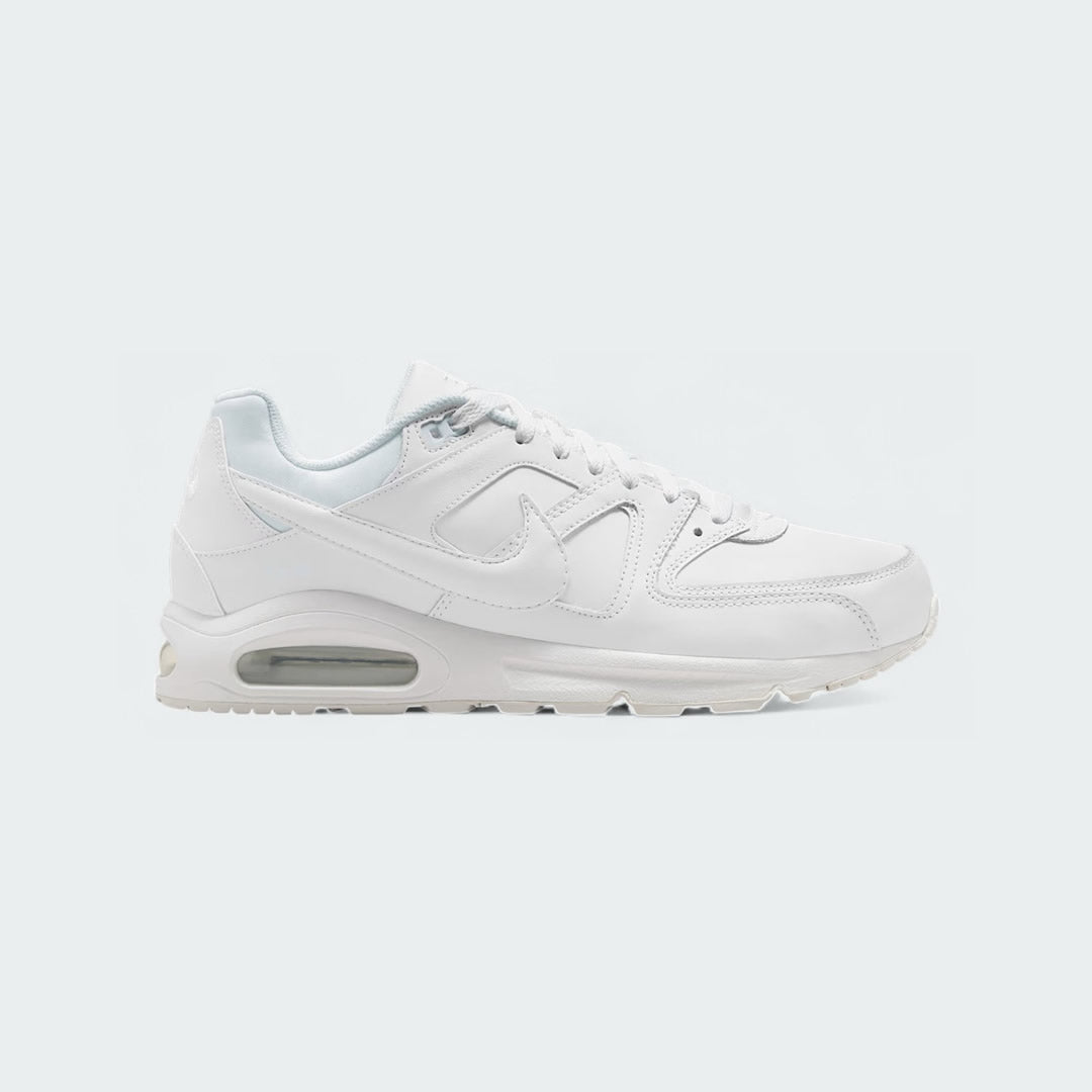 Nike Air Max Command Men's leather trainers in white, side profile showing leather upper, visible Max Air unit in heel, and black Nike Swoosh.