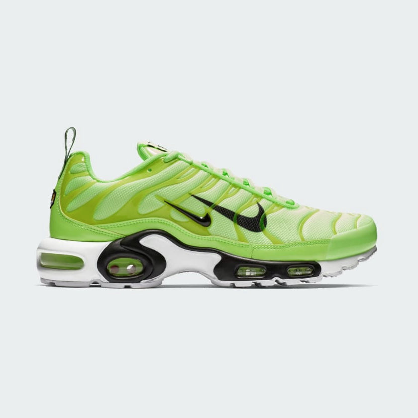 Side profile of Nike Air Max Plus Men's "Lime Blast" trainers, showcasing the vibrant lime and black colourway, visible Tuned Air unit, and wavy upper design.