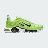 Side profile of Nike Air Max Plus Men's "Lime Blast" trainers, showcasing the vibrant lime and black colourway, visible Tuned Air unit, and wavy upper design.
