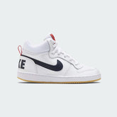 Nike Court Borough Mid Juniors White Trainers 839977-107 side view showing white synthetic leather upper with mid-cut collar and Swoosh branding