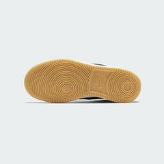 Nike Court Borough Mid Juniors White Trainers 839977-107 outsole with circular pivot pattern and durable rubber tread