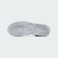View of the outsole of the Jordan Flight Origin 4 Men's grey basketball shoes, showing the durable rubber tread pattern for multi-directional traction.
