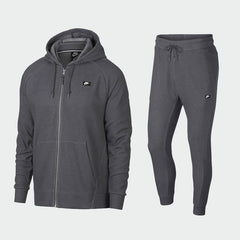 Nike Optic Zip Suit in slate grey, front view showing the full-zip hoodie and matching tapered pants.