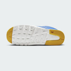 View of the outsole of the Nike Air Span II SE men's blue trainers, showing the durable rubber tread pattern for traction.
