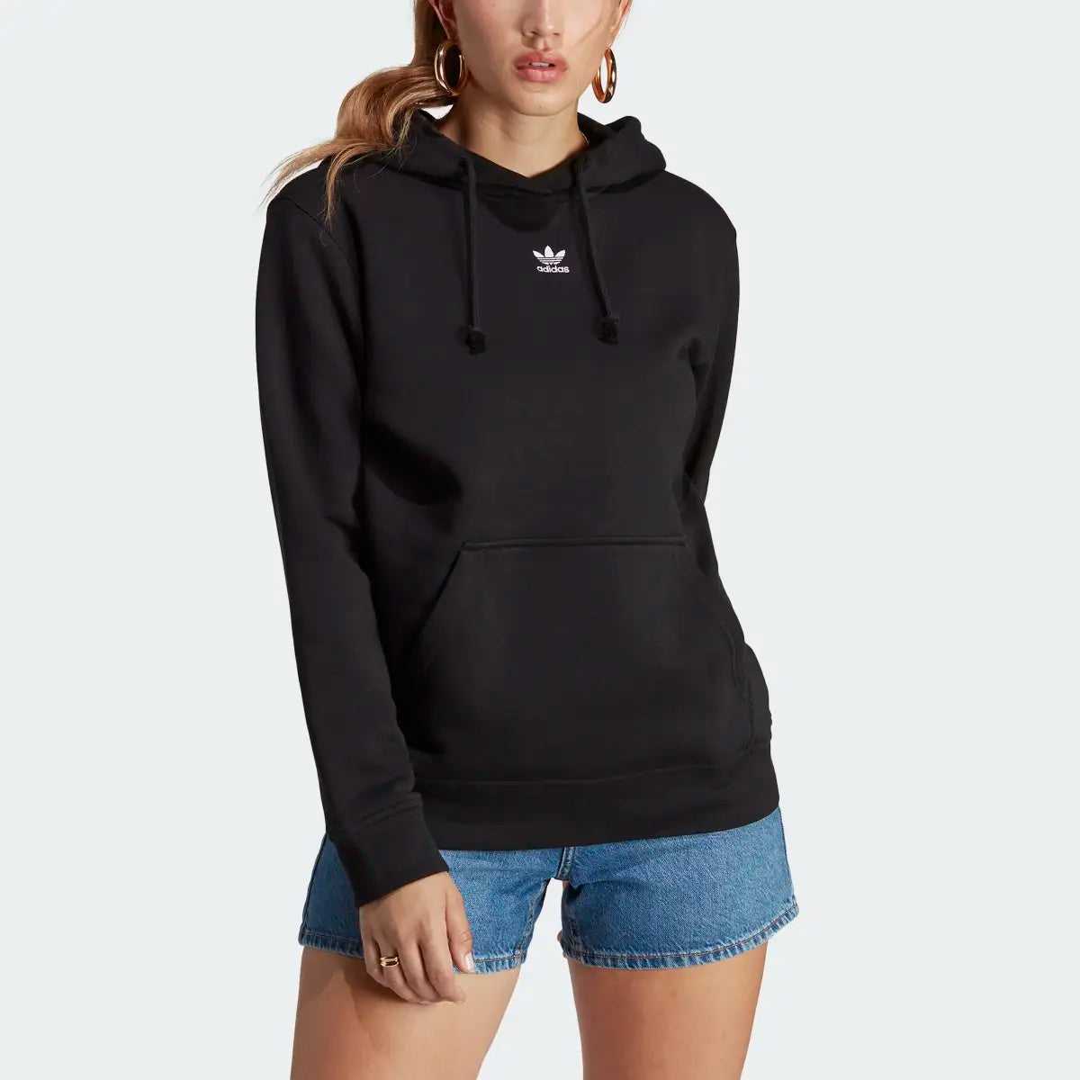 Adidas Adicolor Essentials Fleece Hoodie Women's in black, front view showing the drawcord hood, kangaroo pocket, and small embroidered Trefoil logo on the chest.