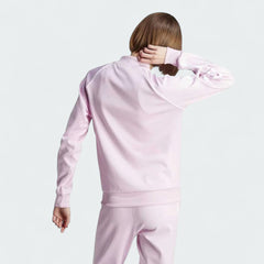 Adidas Adicolor Classics Superstar Track Jacket in orchid fusion pink, back view showcasing the clean design and ribbed details.