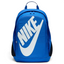 Overhead view of the backpack laid flat, highlighting the dual-zipper configuration and the oversized white Nike logo on the front.