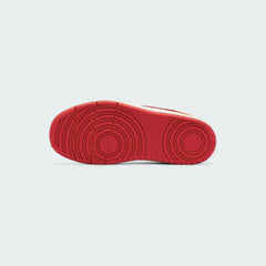 View of the outsole of the Nike Court Borough Low 2 children's trainers, showing the durable rubber sole and traction pattern.