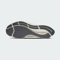 View of the outsole of the Nike Air Zoom Pegasus 37 Men's grey running trainers, showing the durable rubber waffle-inspired tread pattern for road traction.