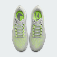 Top-down view of a pair of Nike Air Zoom Pegasus 37 Men's running trainers in grey, highlighting their streamlined silhouette and lace-up closure.