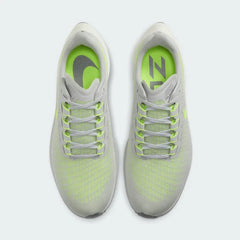 Top-down view of a pair of Nike Air Zoom Pegasus 37 Men's running trainers in grey, highlighting their streamlined silhouette and lace-up closure.