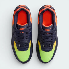 Top-down view of the trainers, highlighting the navy leather panels, black lacing system, and the Lemon Venom branding on the tongue.