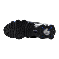 View of the outsole of the Nike Shox TL men's black sneakers, showing the durable rubber sole and the visible Shox columns.