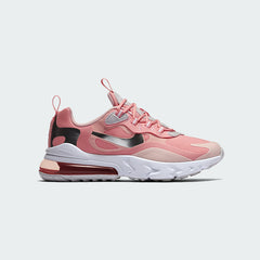 Nike Air Max 270 Juniors' trainers in bleached coral pink with white accents, side profile showing prominent 270-degree visible Max Air unit and React foam midsole.