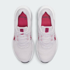 Top-down view of a pair of Nike Run Swift 2 Women's running shoes in pink, highlighting their streamlined silhouette and lace-up closure.