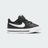 Nike Court Legacy Toddlers' shoes in black with white Nike Swoosh, side profile showing synthetic leather upper, hook-and-loop strap, and rubber sole.