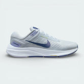 Side profile of the Nike Air Zoom Structure 24 Women's trainers in Pure Platinum, showing the Diffused Blue Swoosh and the supportive foam midsole.