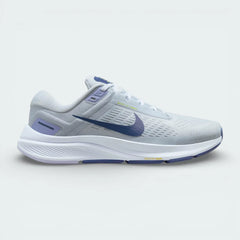 Side profile of the Nike Air Zoom Structure 24 Women's trainers in Pure Platinum, showing the Diffused Blue Swoosh and the supportive foam midsole.