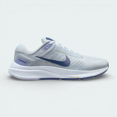 Side profile of the Nike Air Zoom Structure 24 Women's trainers in Pure Platinum, showing the Diffused Blue Swoosh and the supportive foam midsole.