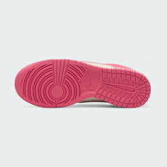 View of the outsole of the Nike Dunk Low Next Nature Women's pink trainers, showing the durable rubber sole and pivot circle traction pattern.