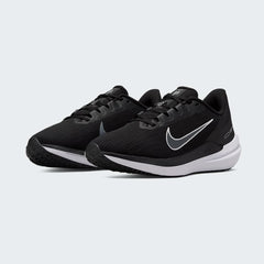 Nike Air Winflo 9 Women's Black Running Shoes DD8686-001 angled view highlighting streamlined silhouette and responsive cushioning design