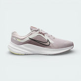 Nike Quest 5 Women's running shoes in platinum violet, side profile showing the black Swoosh, lightweight mesh upper, and the elevated foam midsole.