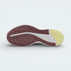 View of the outsole of the Nike Quest 5, showing the black rubber tread pattern designed for reliable road traction.