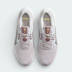 Top-down view of the platinum violet Nike Quest 5 shoes, highlighting the breathable mesh texture and the purple lacing system.