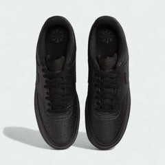 Top-down view of a pair of Nike Court Vision Lo Next Nature Men's trainers in black, highlighting the lace-up closure and perforated toe box.