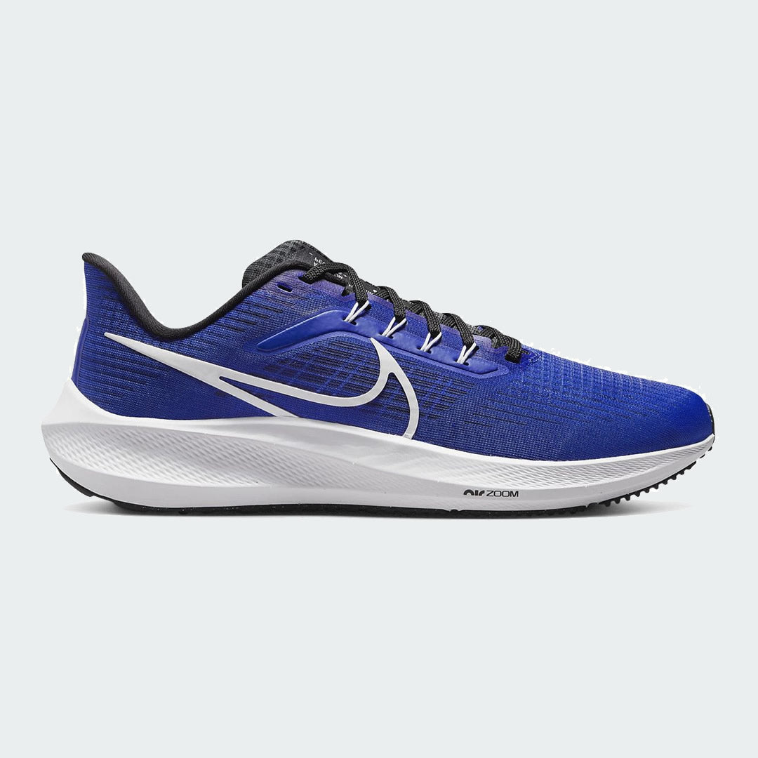 Nike Air Zoom Pegasus 39 Men's running trainers in racer blue with white accents, side profile showing engineered mesh upper, prominent Nike Swoosh, and cushioned midsole.