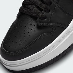 Close-up zoom on the front of the Air Jordan 1 Elevate Low Women's trainers, showing the perforated toe box, lacing system, and textured leather upper.