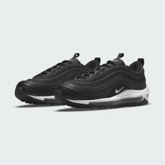 Angled view of two Nike Air Max 97 Women's black trainers, side by side, showcasing their timeless design and futuristic profile.