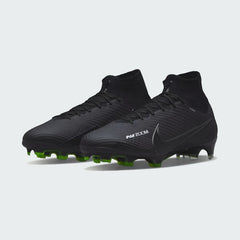 Angled view of two Nike Zoom Superfly 9 Elite FG men's football boots, side by side, displaying their sleek black design with vibrant volt detailing.
