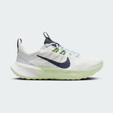 Nike Juniper Trail 2 Women's White Trail Shoes DM0821-103 side view showing white mesh upper with blue overlays and rugged trail outsole