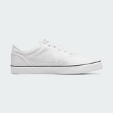 Nike SB Chron 2 Canvas Men's trainers in white, side profile showing canvas upper, classic Swoosh, and vulcanized sole.
