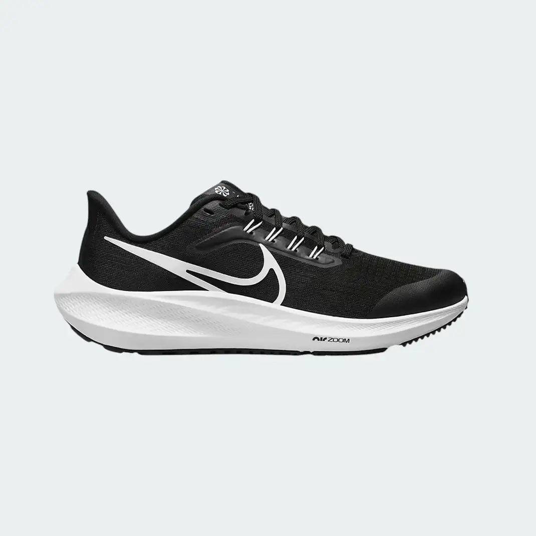 Nike Air Zoom Pegasus 39 Next Nature running trainers in black with white accents, side profile showing engineered mesh upper, prominent Nike Swoosh, and cushioned midsole.