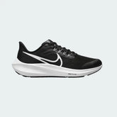 Nike Air Zoom Pegasus 39 Next Nature running trainers in black with white accents, side profile showing engineered mesh upper, prominent Nike Swoosh, and cushioned midsole.