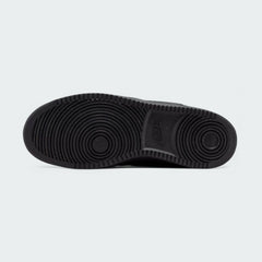 View of the outsole of the Nike Court Vision Mid Next Nature Men's black shoes, showing the durable rubber sole and pivot circle traction pattern.