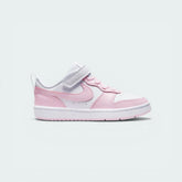 Side profile of the White and Pink Foam Nike Court Borough Low 2 Infants, highlighting the low-top silhouette and the soft pink Swoosh.