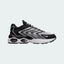 Nike Air Max TW trainers in black and white, side profile showing the layered, angular upper design and the visible Air Max unit with multiple windows in the heel.